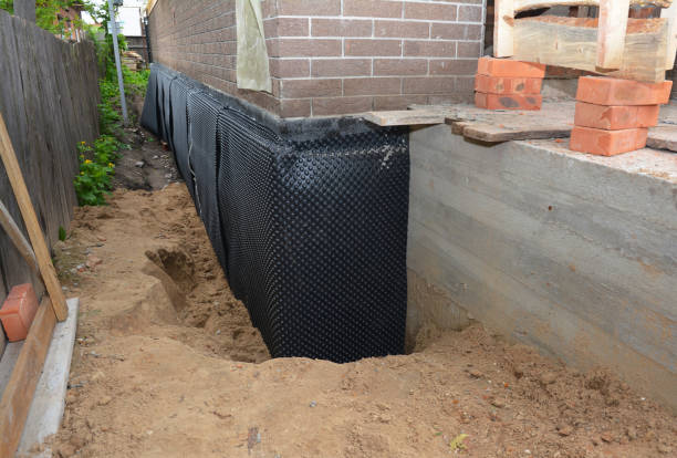 SJ Waterproofing Pros technician performing targeted Sump Pump Installation assessment in Clementon, NJ